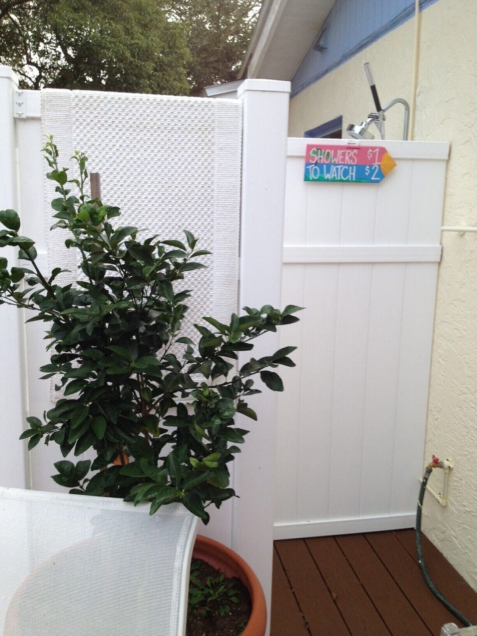 Spacious outdoor shower with hot & cold water steps from the primary bedroom.