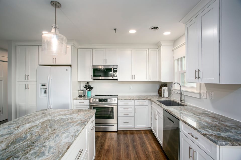 Newly remodeled kitchen is fully stocked for all your needs.