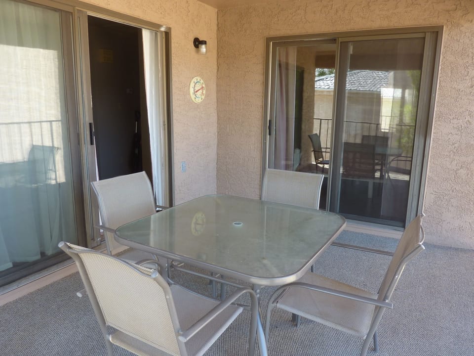 Balcony - sliding door on left goes to the living room, on right to the bedroom.