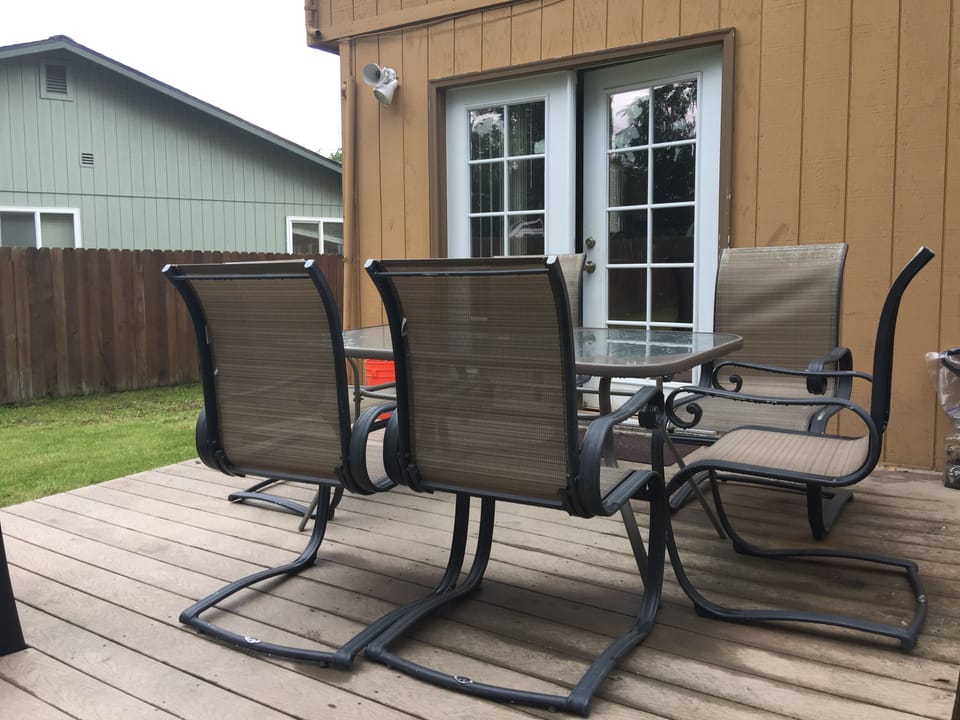 Patio table/chairs for a morning fresh air or enjoying the fire pit. 