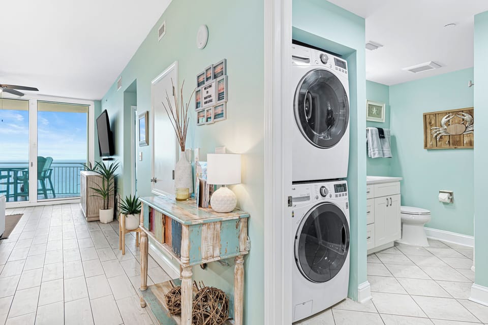 Welcome Center & full size LG washer and dryer inside the 2nd shared bath.