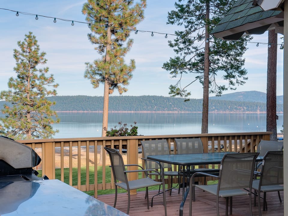 Wraparound deck with 2 patio tables (seating for 12)