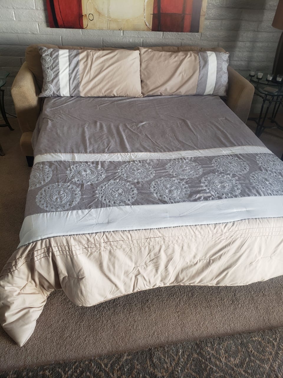 Queen size memory foam sleeper in the living room.