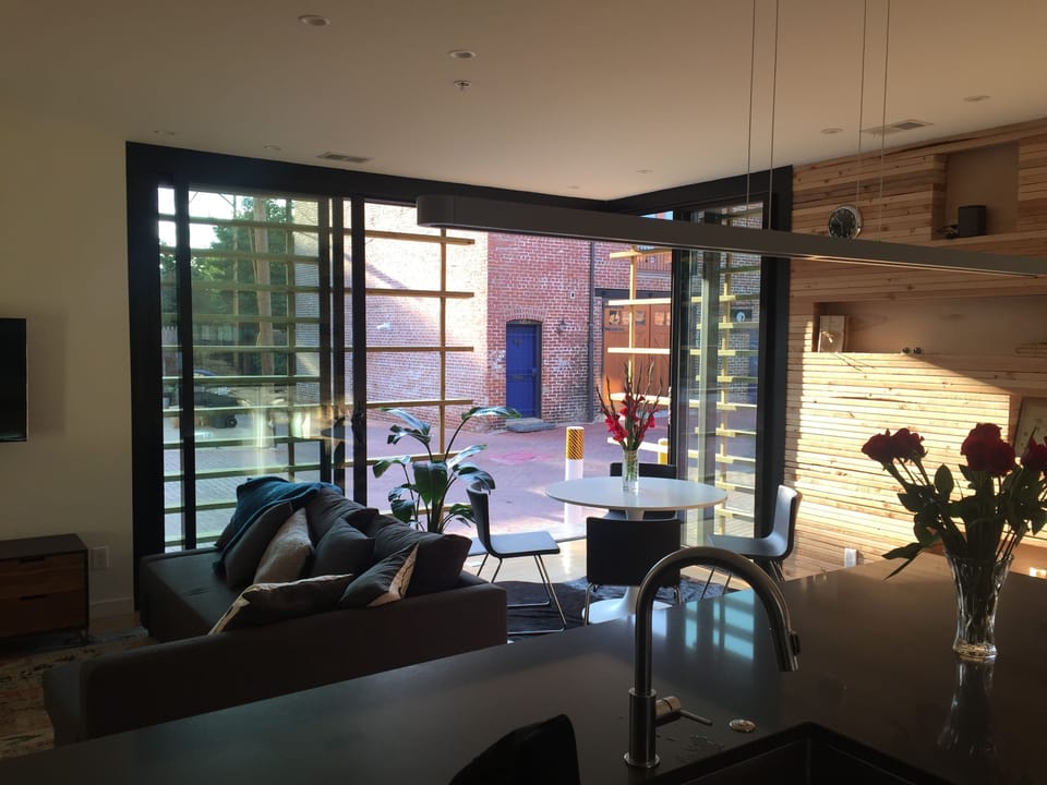 Living room opens to courtyard 