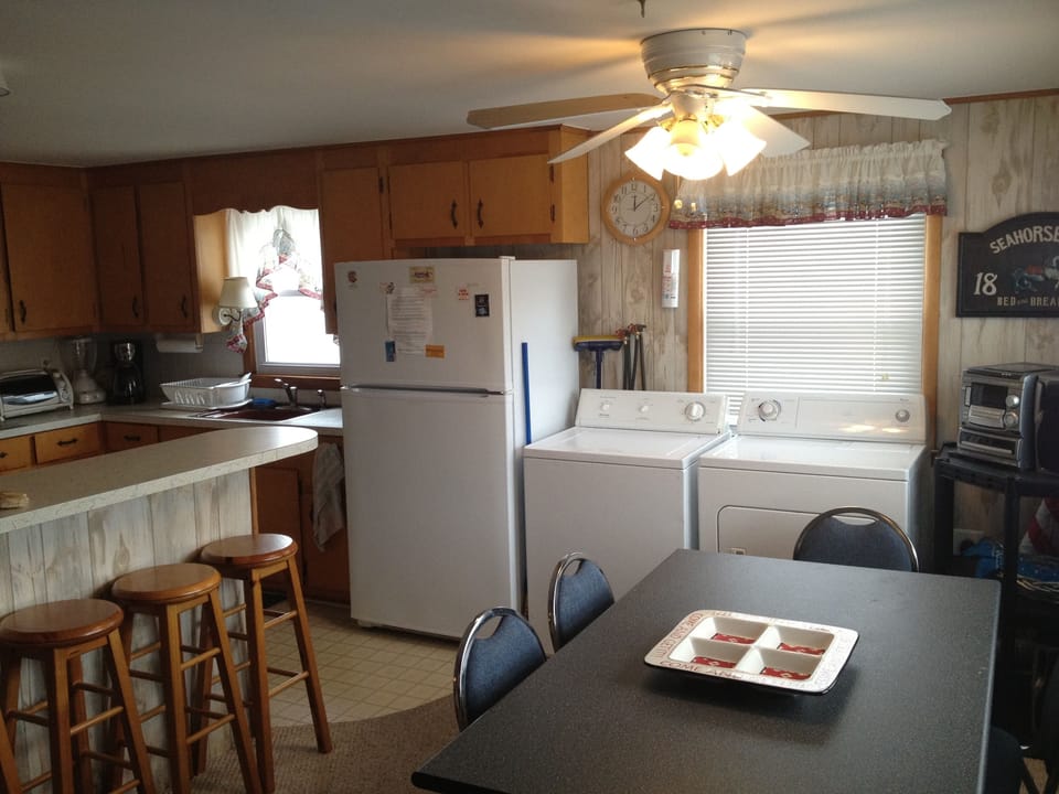 Dining and Kitchen area with washer and dryer