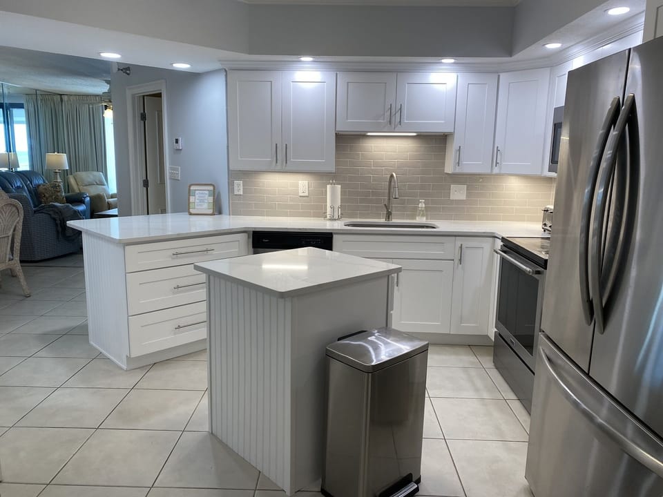 quartz countertops with stainless steel appliances