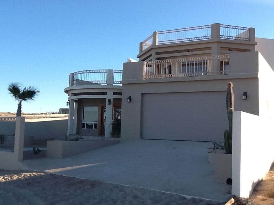Nice sandy area for kids to play in front, no traffic to worry about! Garage!