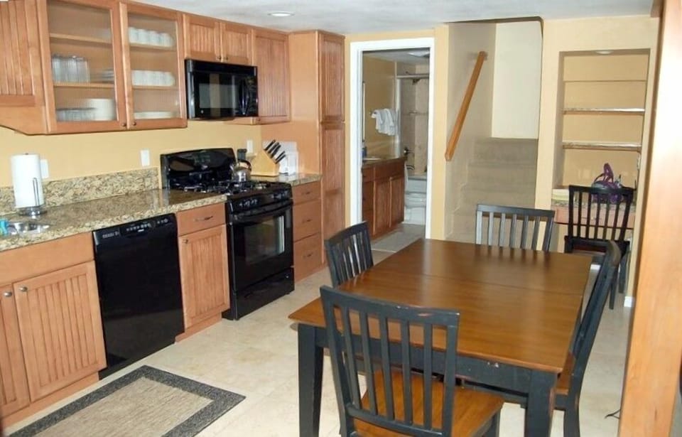 kitchen and downstairs bath and stairs to upstairs with all new appliances