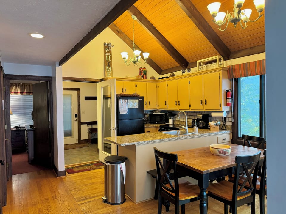 Stocked kitchen with table seating for 6-8. 