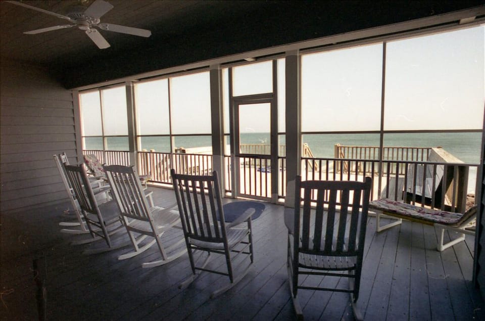 The screen porch is everyone's favorite place to relax, read, or just have fun!