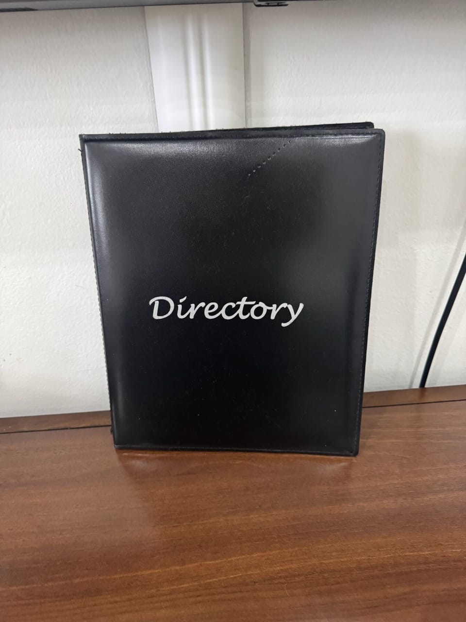 Directory Book: has WIFI log in credentials, public paid parking info