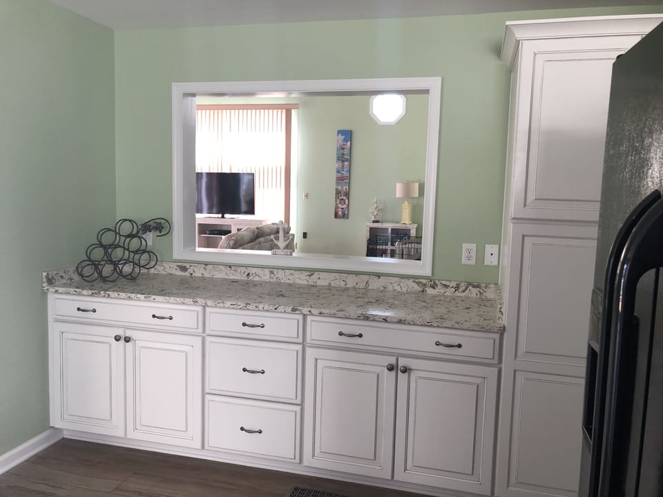 Spacious fully stocked kitchen.