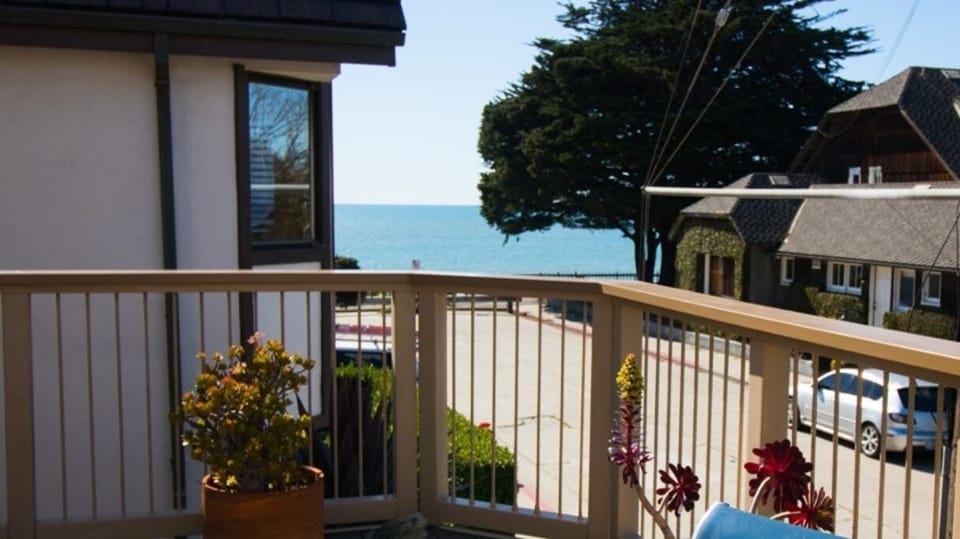 Just 2 houses down and to the left, a set of stairs to the beach awaits!
