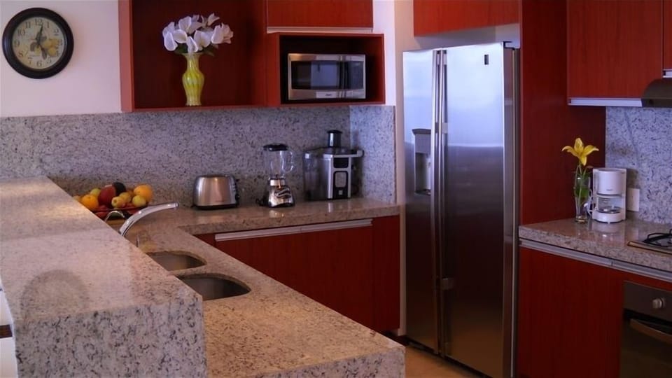 Kitchen w/ granite, stainless. d/wash, gas stove-glass table seats 4-bar seats 5