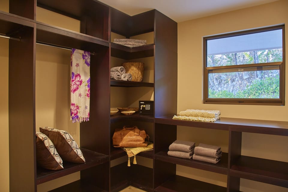 MASTERBEDROOM WALK-IN  CLOSET WITH LAPTOP SIZE PERSONAL SAFE
