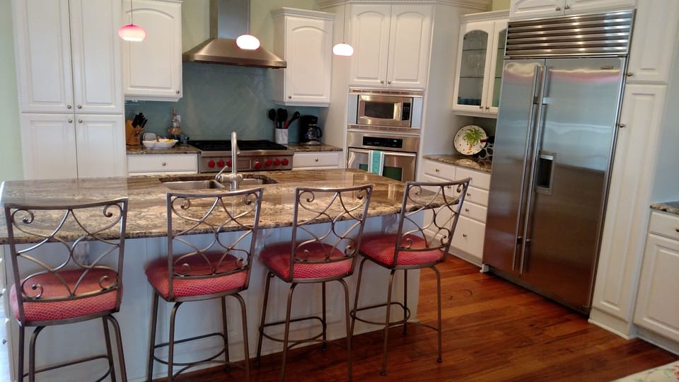 Roomy kitchen with Wolf stove and Sub-Zero refrigerator