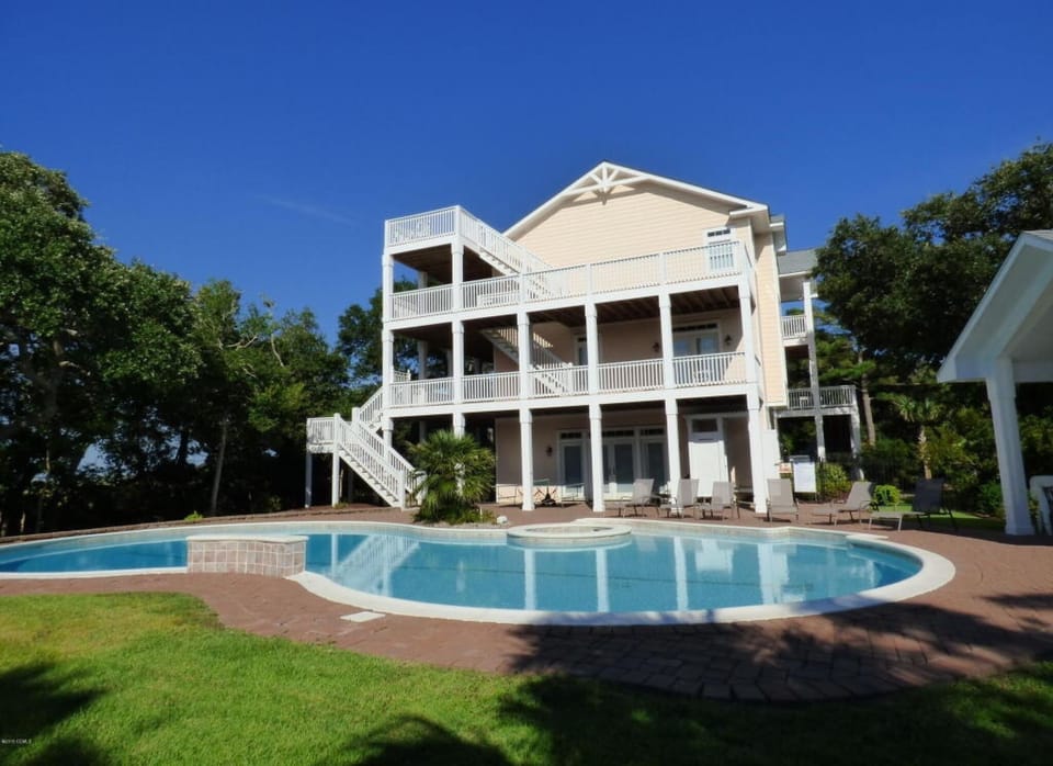 Enjoy the large, private in-ground saline pool, whirlpool and gorgeous view.
