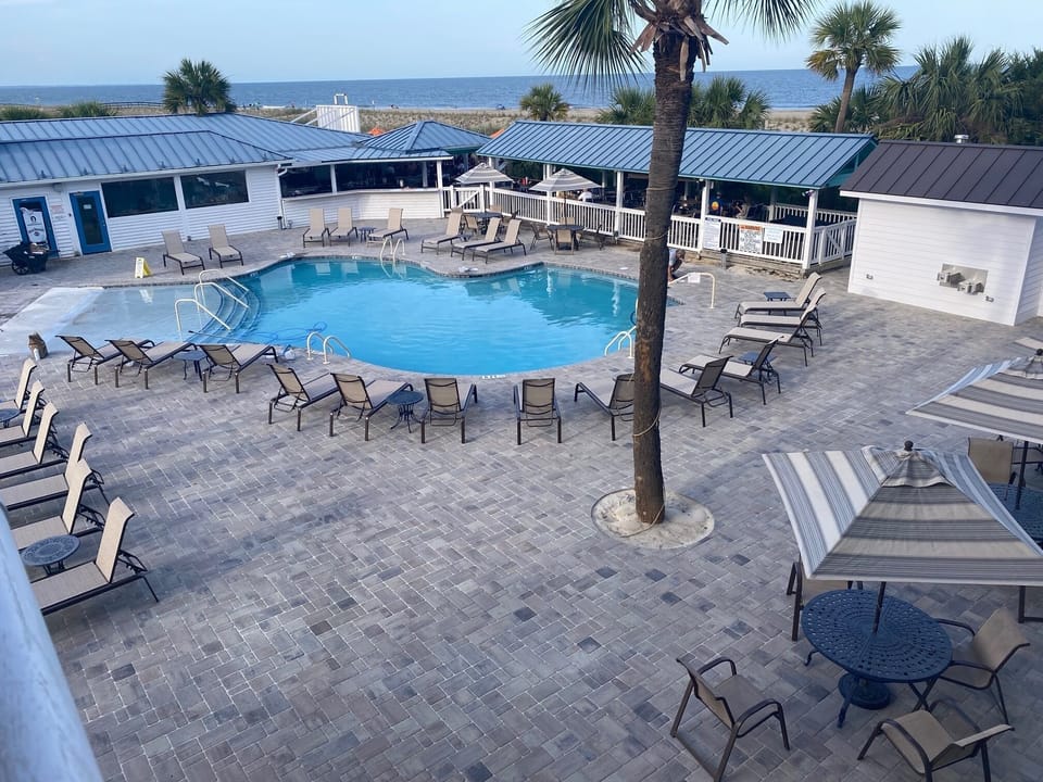 Zero Entry Pool - 5 Ft Depth
The Deck Restaurant and Bar - onsite in background