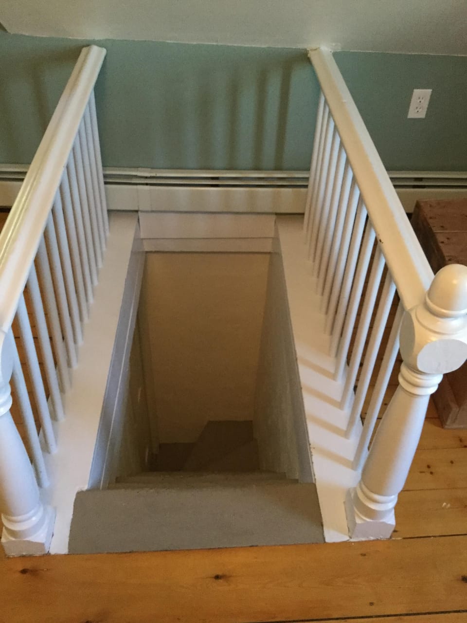 A view of the stairway from the south bedroom to the living room. 