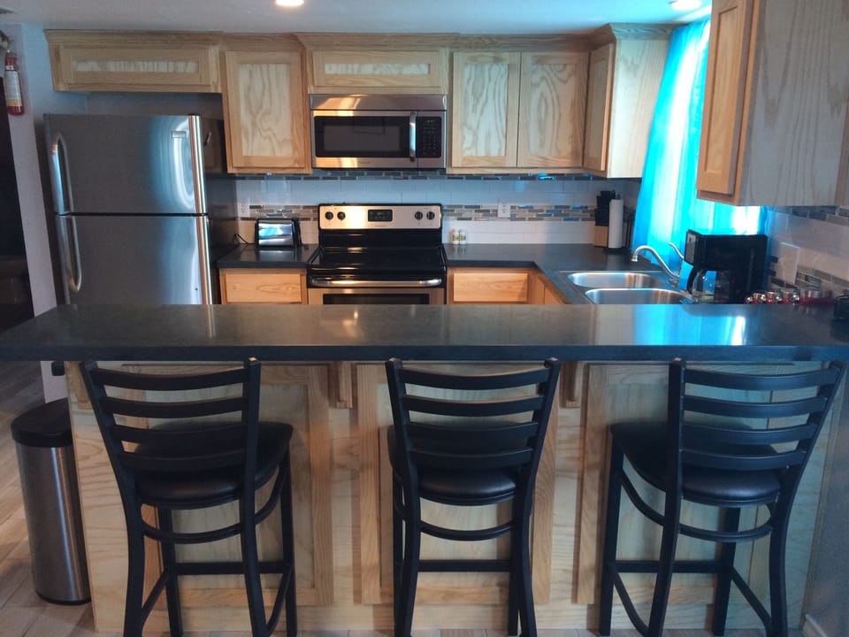 Kitchen area looking from Living area