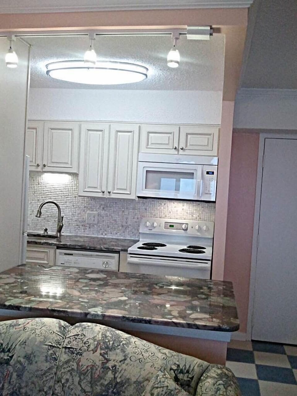 Kitchen with brand new cabinets and granite