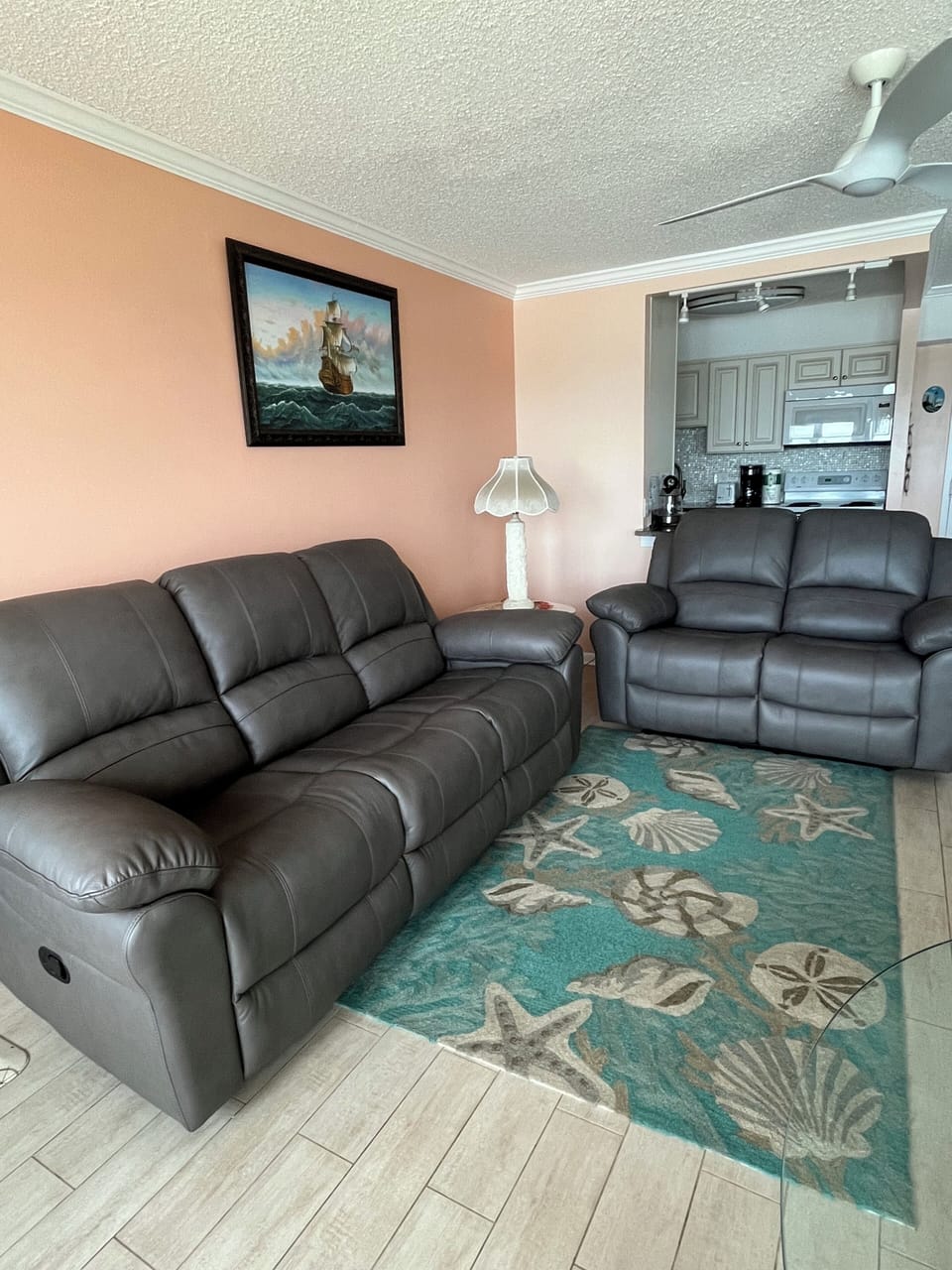 Brand new leather reclining sofa and love seat