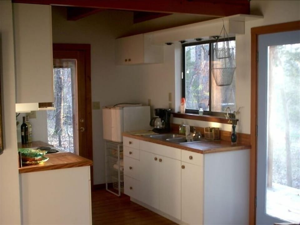 This small kitchen has every thing needed for enjoying a meal.