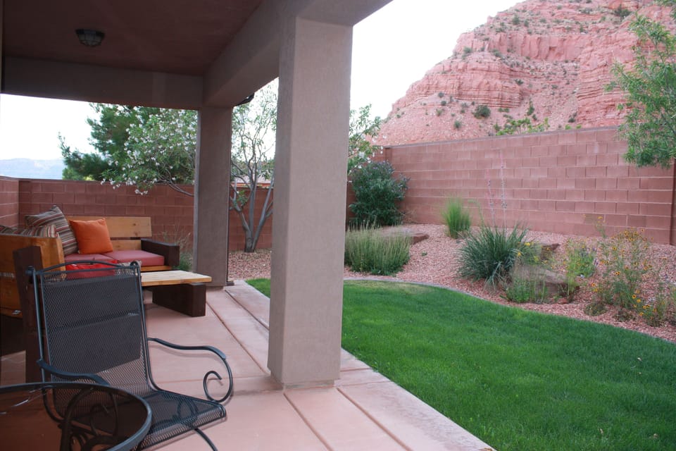 Patio has amazing views of red cliffs.   Private  yard, beautiful landscaping.