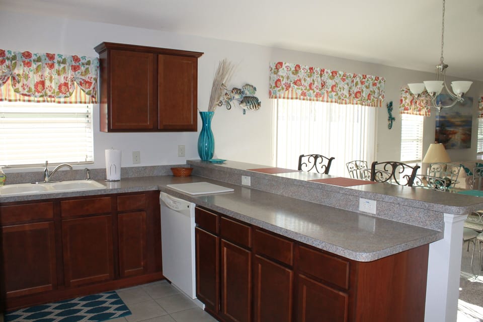 Large Breakfast Bar overlooking living/dining areas