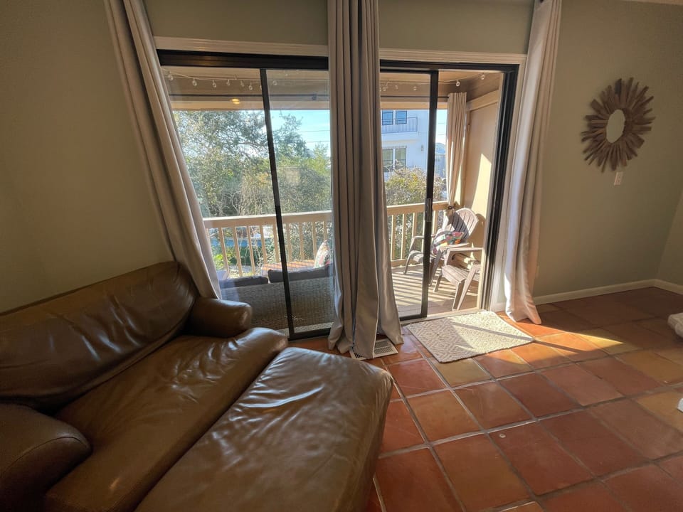 Enjoy some wonderful Florida sun from the oversized leather chair. 