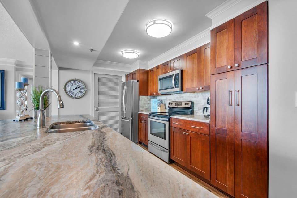 Spectacular kitchen with pantry area and stainless appliances