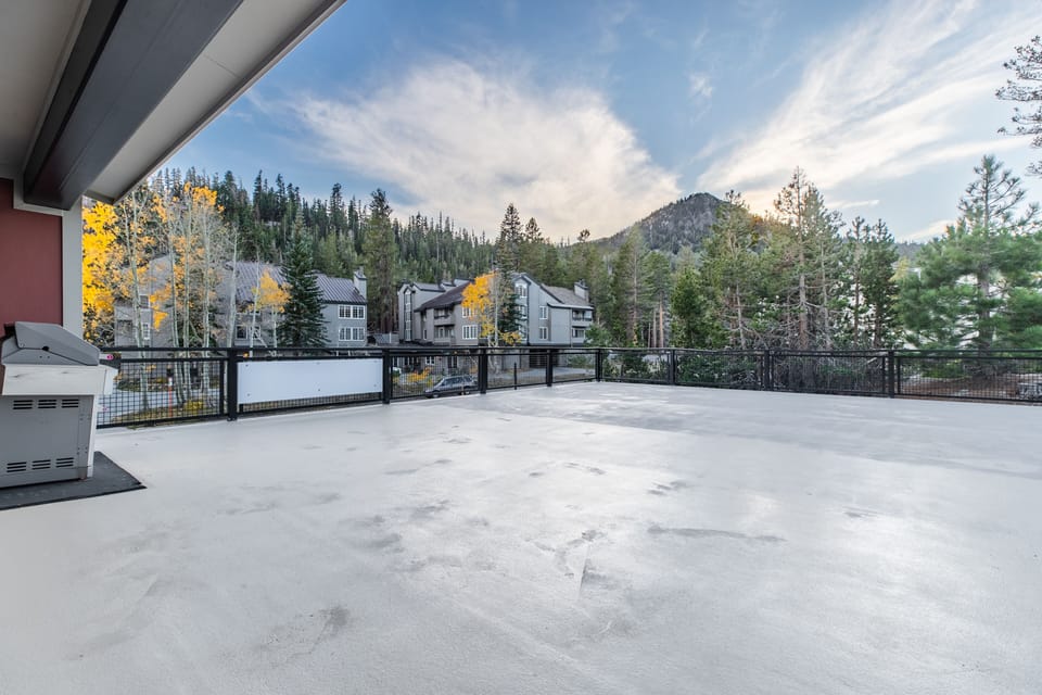 Patio and BBQ with view of Canyon Lodge