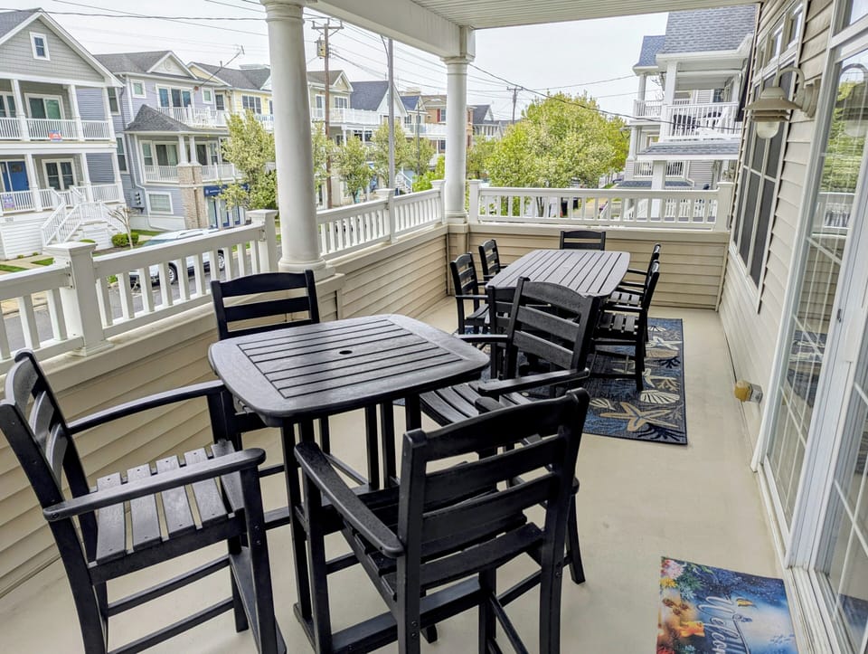 Oversized and covered deck with ample seating for 10 to enjoy the fresh air.