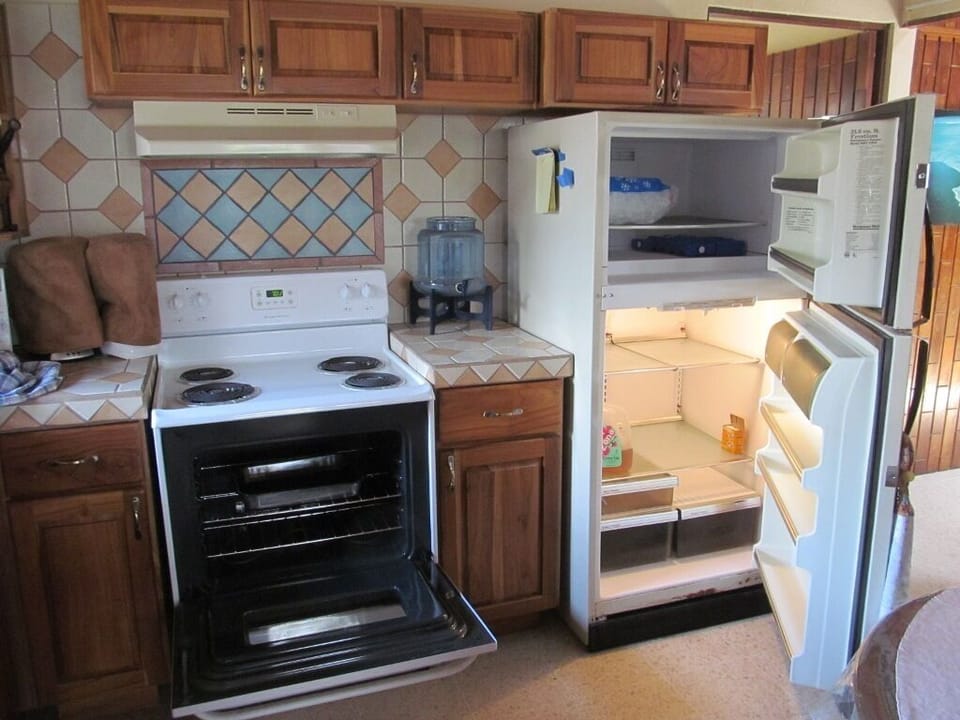 stove oven is 2007 model, fridge 2018 , new teak cabinets 2014