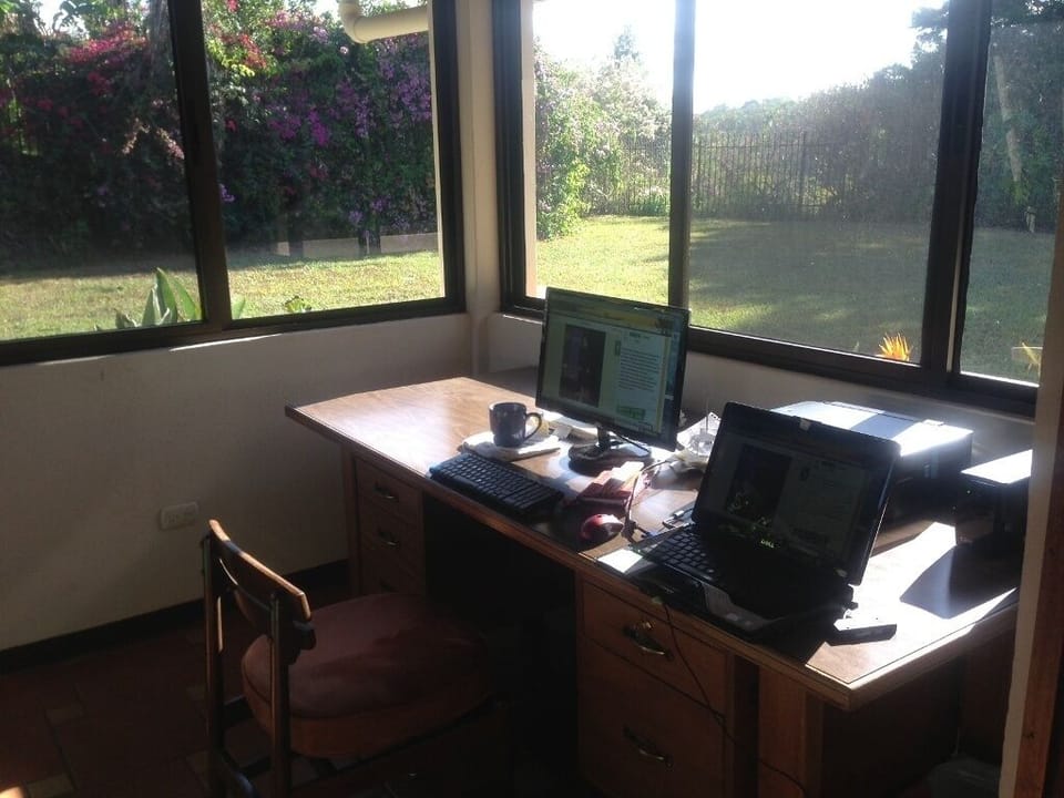Sunny desk 6 ft+ wide, printer-ups-speakers, you bring computer, pad, etc