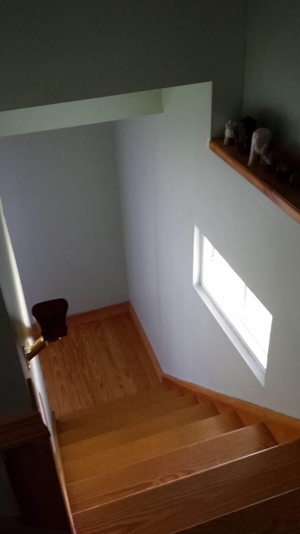 stairs to the game area, downstairs living room and pool table