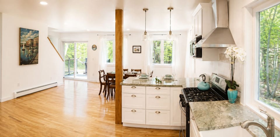 Spacious open concept Kitchen & Dining.  Hardwood floors, granite counters