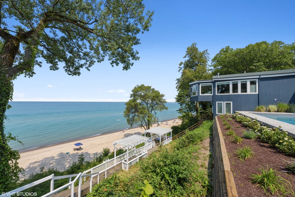 Nest has it's own private stairway to the sandy private association beach