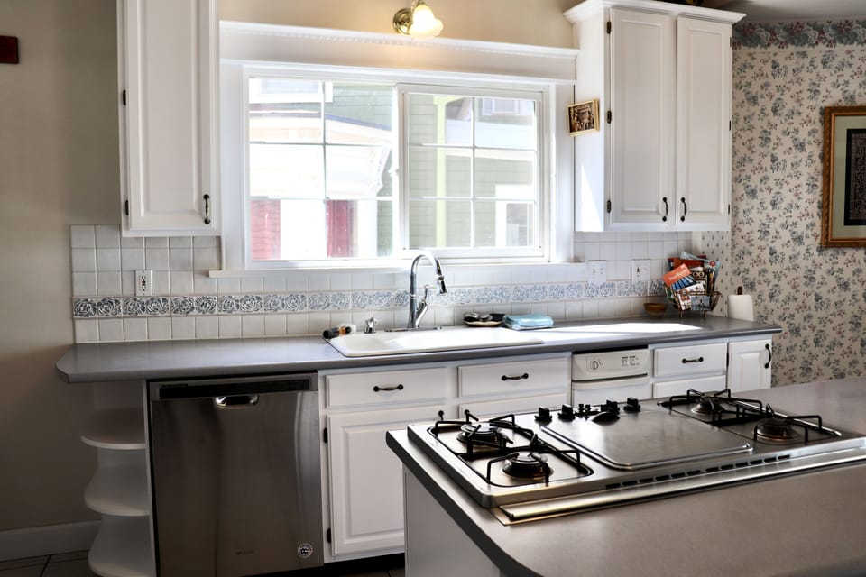 Full Kitchen, Island, and Dining Table