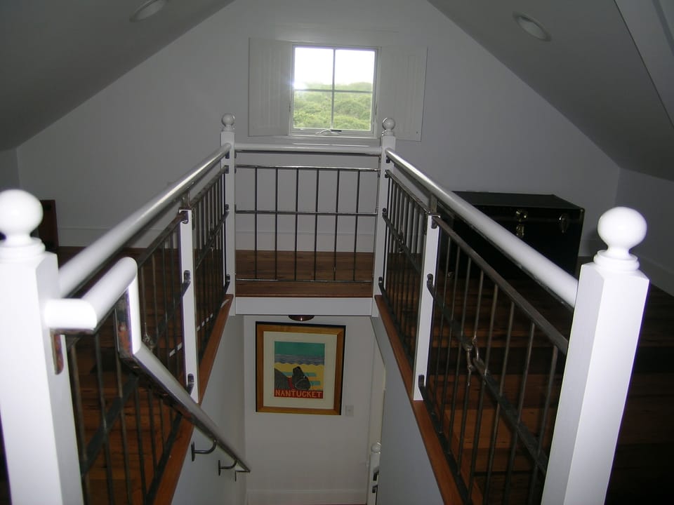 Stairs from kitchen to loft