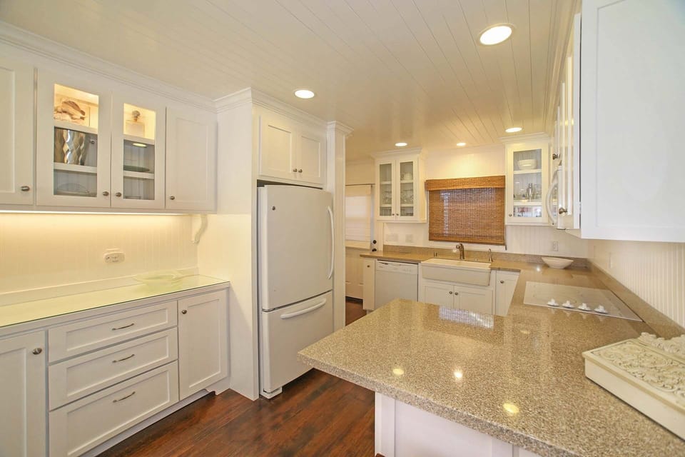Kitchen and Buffet Area with Farm House Sink and a Fully Stocked Kitchen