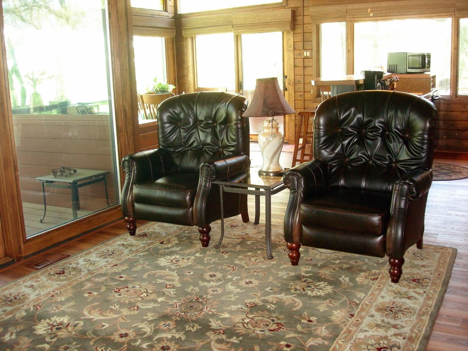 2 leather recliners for watching TV or enjoying the fire