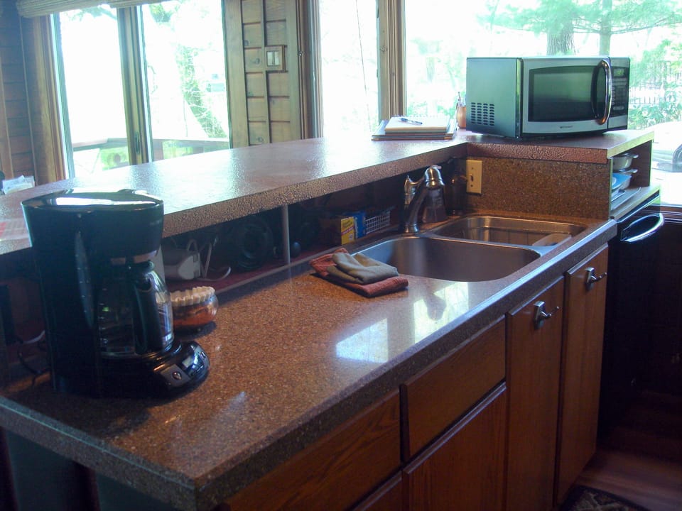 Granite counter tops, dishwasher, microwave, coffee maker and filters
