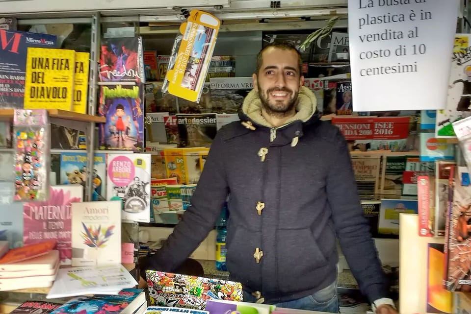 Andrea, from the newspaper stall downstairs. He sells also bus ticket!