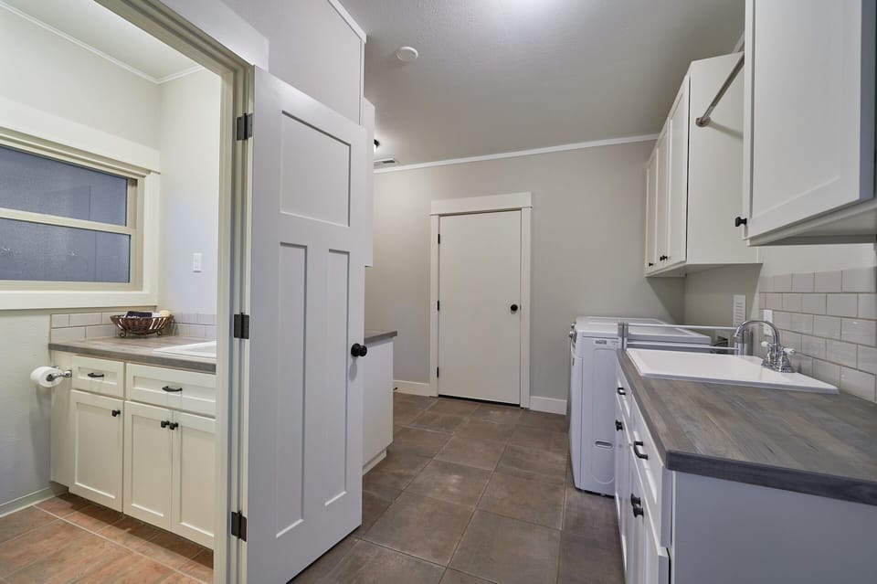 The third bathroom with shower is off the mudroom. 