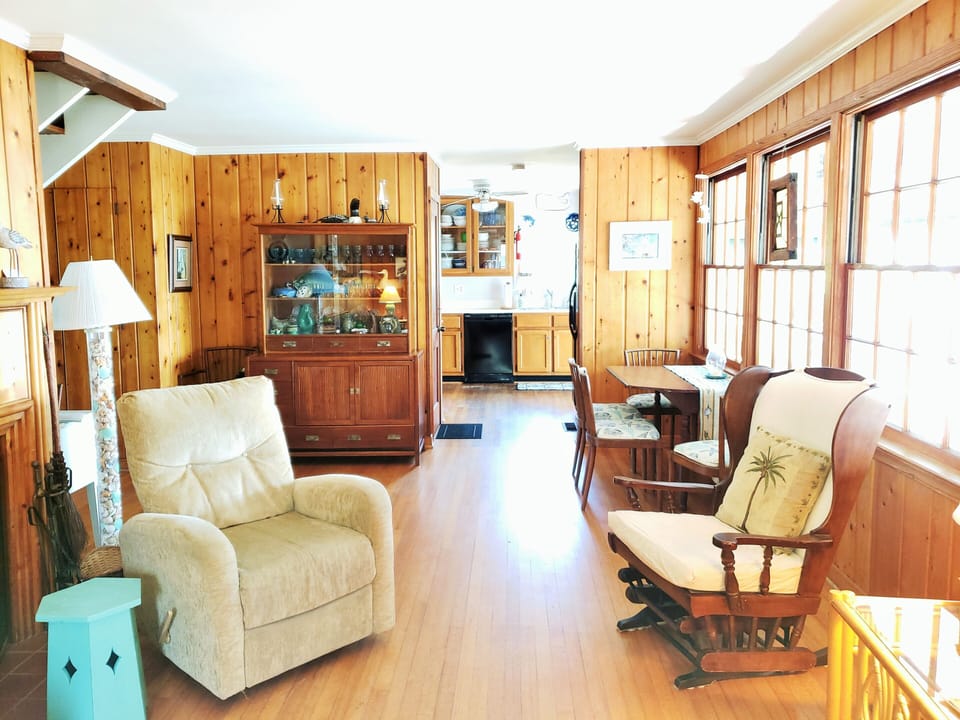 Living room and inside dining table that seats 6