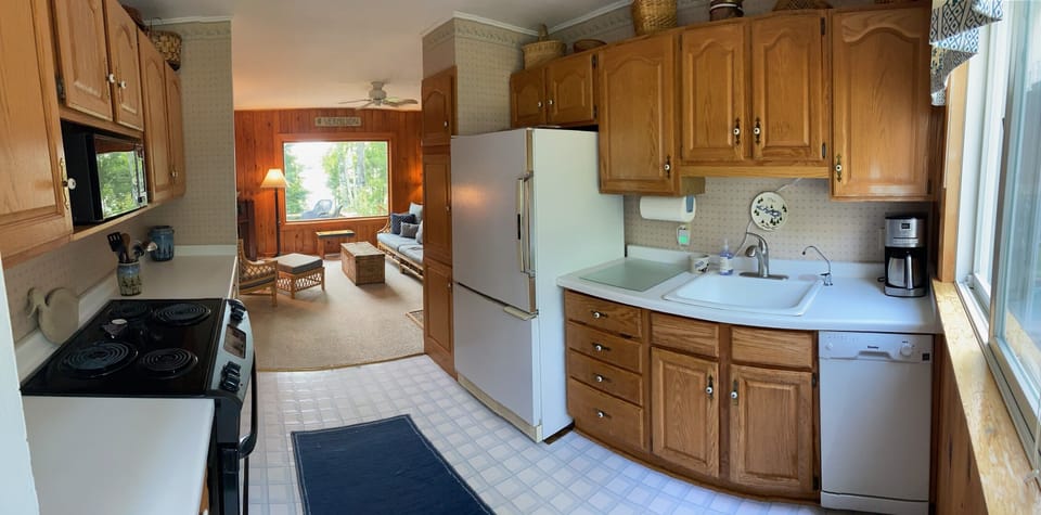 Walking into the kitchen.