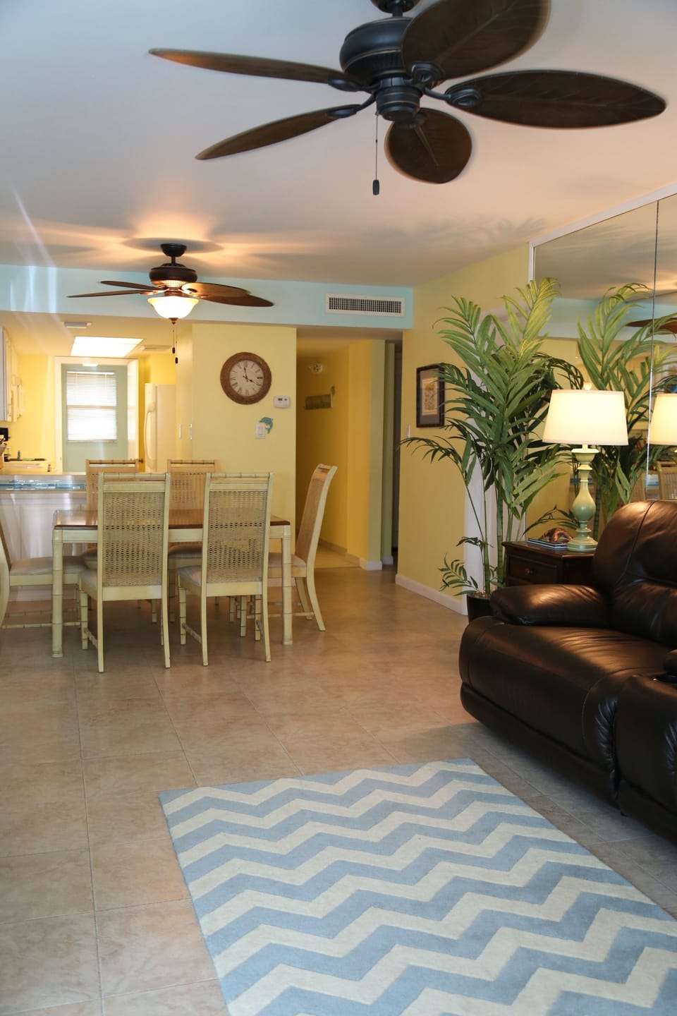 Open Floor plan, view from balcony of living, dining, and kitchen area.