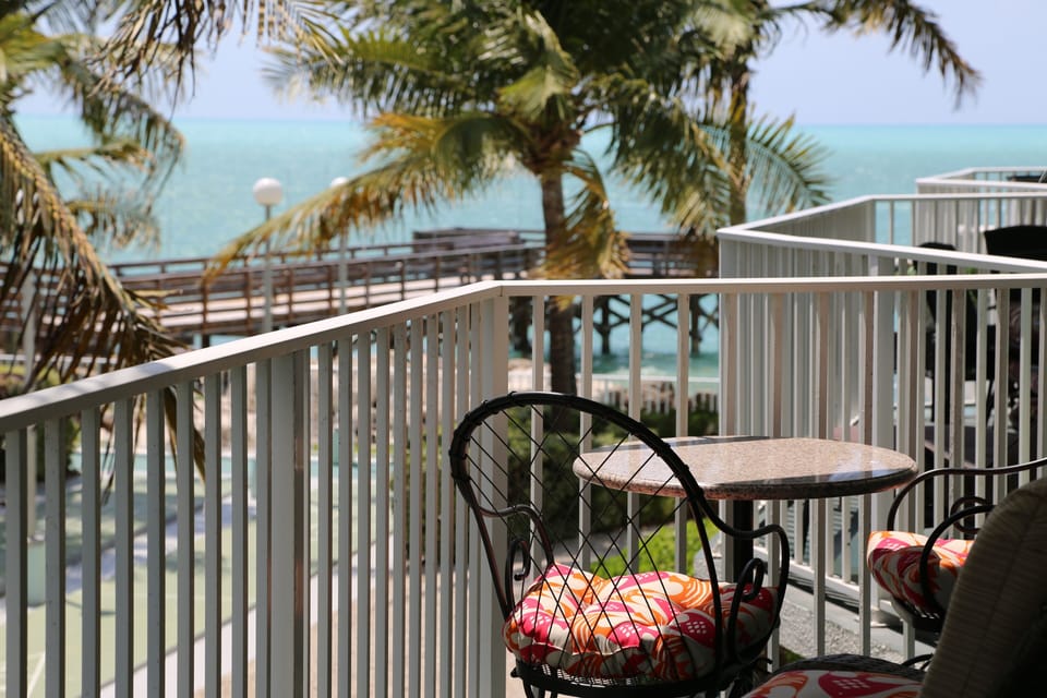 Private balcony off the living room and master bedroom with ocean views.