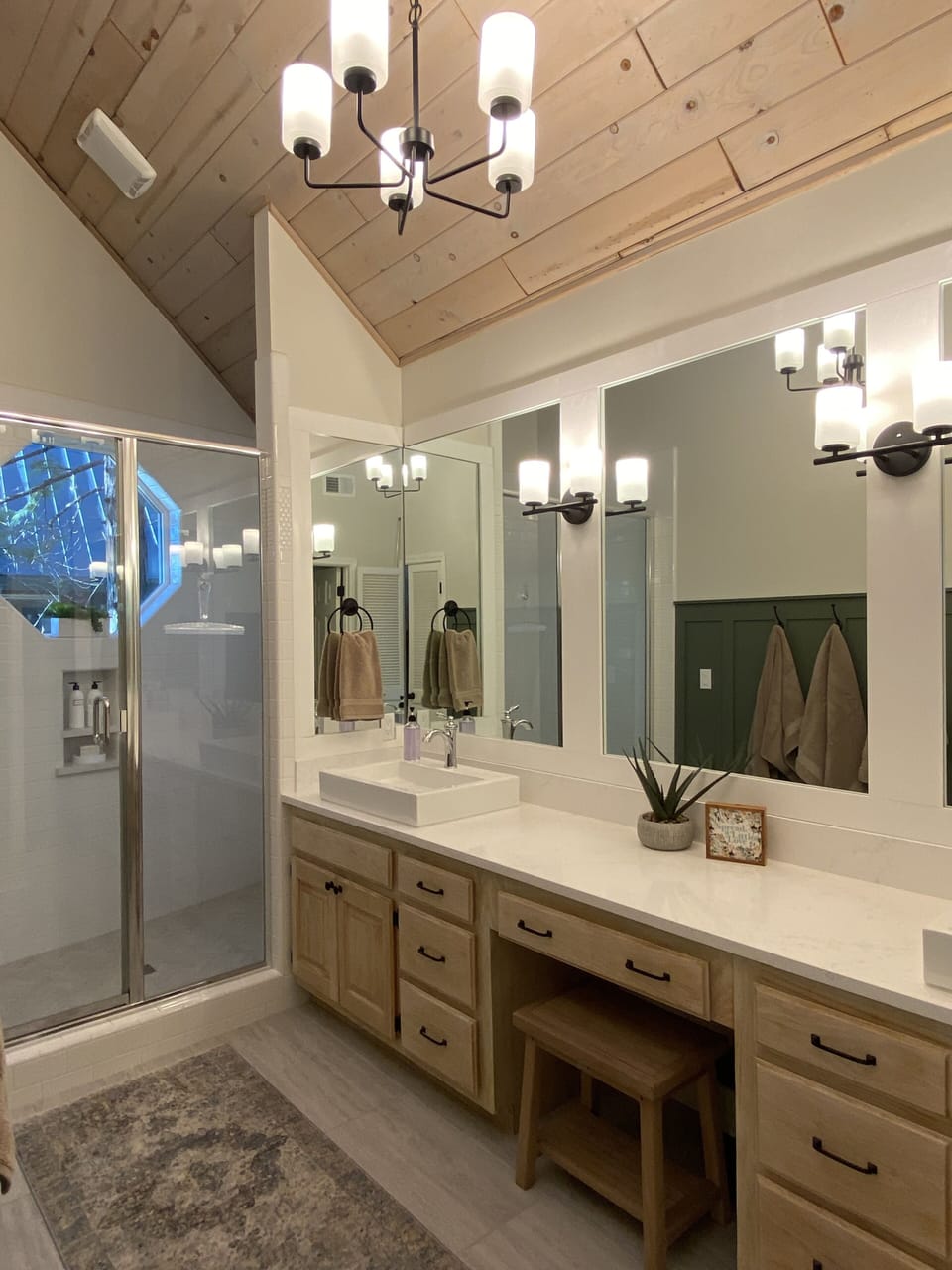 Primary bath for bedroom #1- 2 sinks, double headed shower & private toilet. 